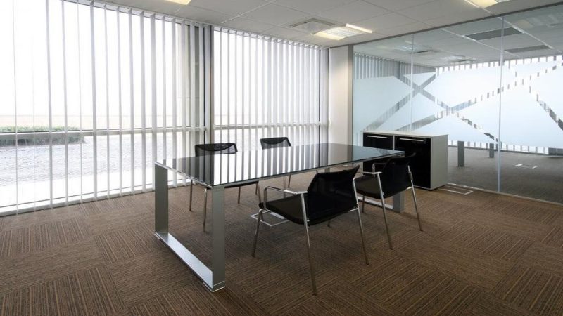 How do curtains affect the atmosphere of an office